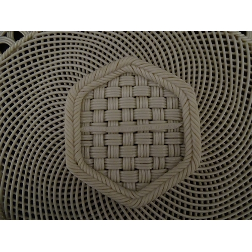 84 - Two Belleek four strand basket weave cake plates. Impressed marks under. Largest approx. 11 1/2