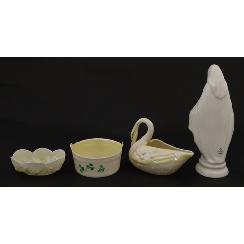 85 - A quantity of Belleek to include an Art Nouveau style butter dish with harpist lady and shamrock det... 