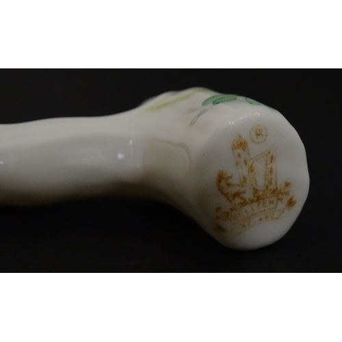 85 - A quantity of Belleek to include an Art Nouveau style butter dish with harpist lady and shamrock det... 