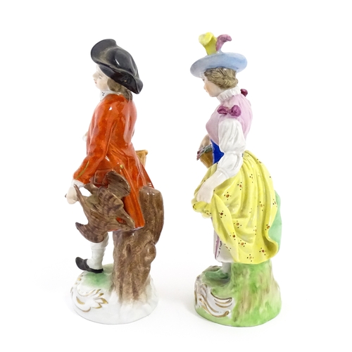 86 - Two Dresden figures comprising The Game Seller, and Lady with Flowers. Marked under. Approx. 6