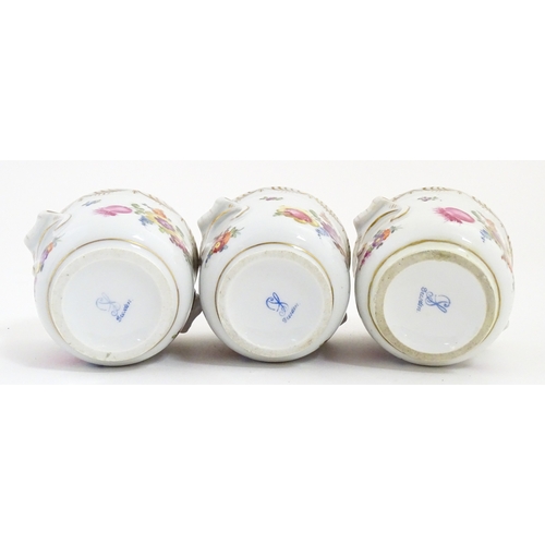 88 - Three small Dresden cache pots / planters with hand painted floral decoration. Marked under. Approx.... 