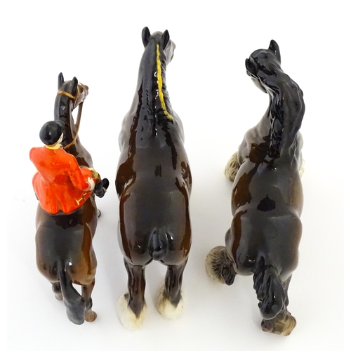 98 - Three Beswick models of horses comprising Huntsman on a Brown Horse, Shire Horse, and Cantering Shir... 