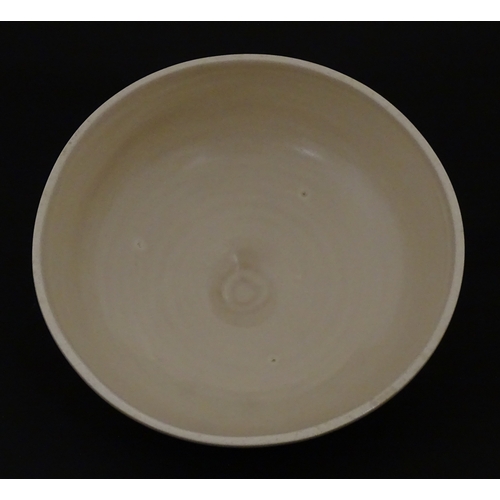 102 - A Wilkinson Clarice Cliff muffin dish. Marked under. Approx. 8 1/2