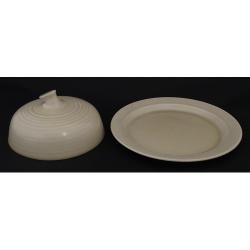 102 - A Wilkinson Clarice Cliff muffin dish. Marked under. Approx. 8 1/2