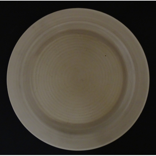 102 - A Wilkinson Clarice Cliff muffin dish. Marked under. Approx. 8 1/2