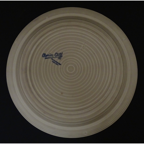 102 - A Wilkinson Clarice Cliff muffin dish. Marked under. Approx. 8 1/2