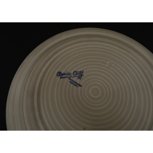 102 - A Wilkinson Clarice Cliff muffin dish. Marked under. Approx. 8 1/2