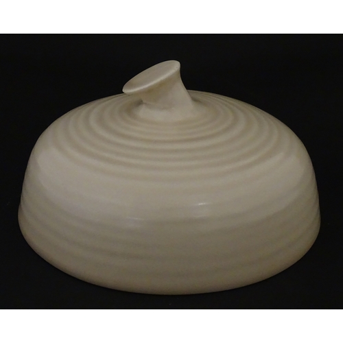 102 - A Wilkinson Clarice Cliff muffin dish. Marked under. Approx. 8 1/2