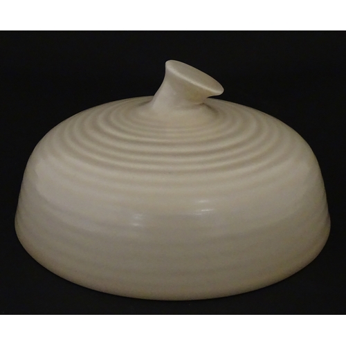 102 - A Wilkinson Clarice Cliff muffin dish. Marked under. Approx. 8 1/2