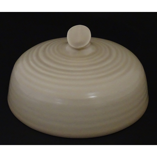 102 - A Wilkinson Clarice Cliff muffin dish. Marked under. Approx. 8 1/2