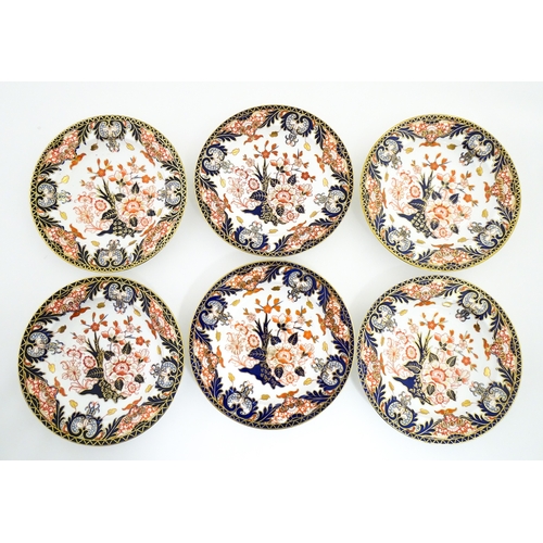 103 - Six Royal Crown Derby dishes decorated in the Imari pattern. Marked under. Approx. 10 1/2