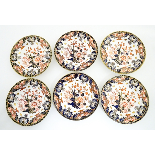 103 - Six Royal Crown Derby dishes decorated in the Imari pattern. Marked under. Approx. 10 1/2