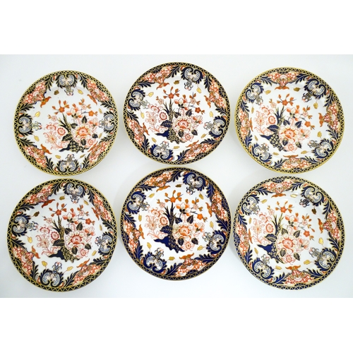 103 - Six Royal Crown Derby dishes decorated in the Imari pattern. Marked under. Approx. 10 1/2