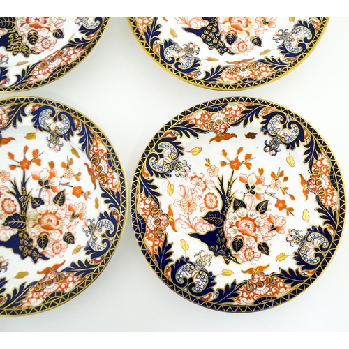 103 - Six Royal Crown Derby dishes decorated in the Imari pattern. Marked under. Approx. 10 1/2