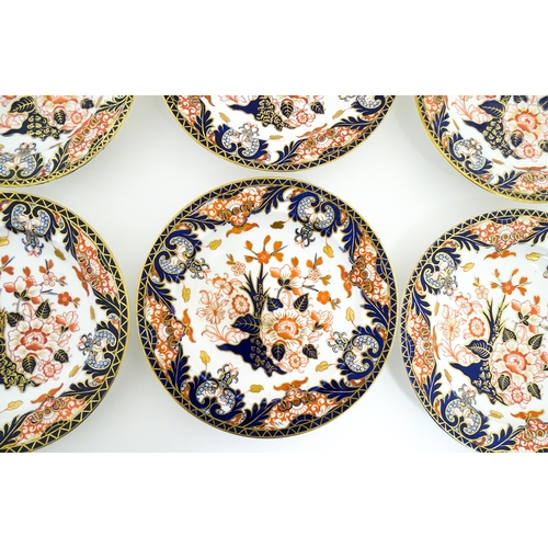 103 - Six Royal Crown Derby dishes decorated in the Imari pattern. Marked under. Approx. 10 1/2