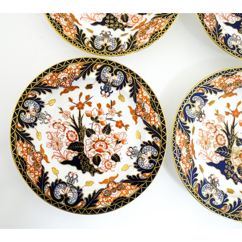 103 - Six Royal Crown Derby dishes decorated in the Imari pattern. Marked under. Approx. 10 1/2