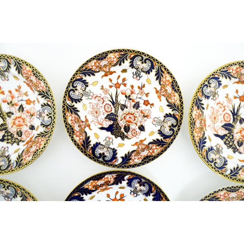 103 - Six Royal Crown Derby dishes decorated in the Imari pattern. Marked under. Approx. 10 1/2