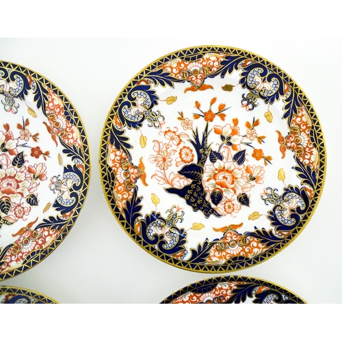 103 - Six Royal Crown Derby dishes decorated in the Imari pattern. Marked under. Approx. 10 1/2