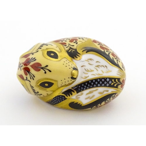 107 - A Royal Crown Derby model of a Dormouse. Marked under. Approx. 2 1/2