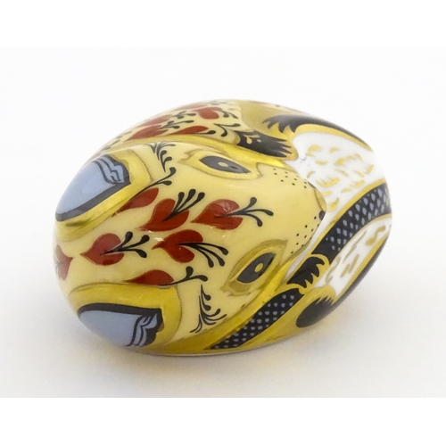 107 - A Royal Crown Derby model of a Dormouse. Marked under. Approx. 2 1/2