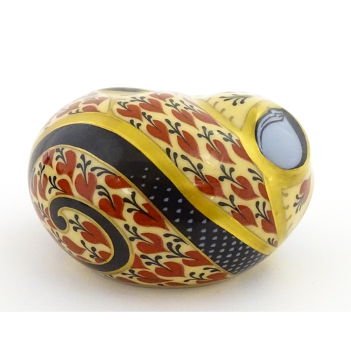 107 - A Royal Crown Derby model of a Dormouse. Marked under. Approx. 2 1/2