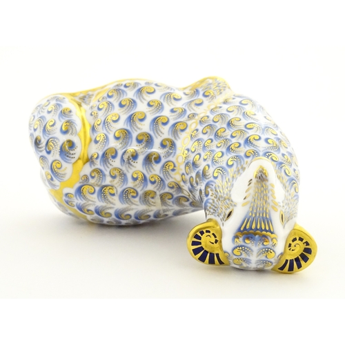 108 - A Royal Crown Derby paperweight modelled as a ram / sheep. Together with a Royal Crown Derby paperwe... 