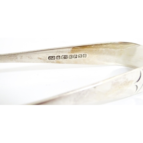 110 - A cased Wedgwood cake / sandwich service in the Melody pattern comprising serving plate, cake plates... 