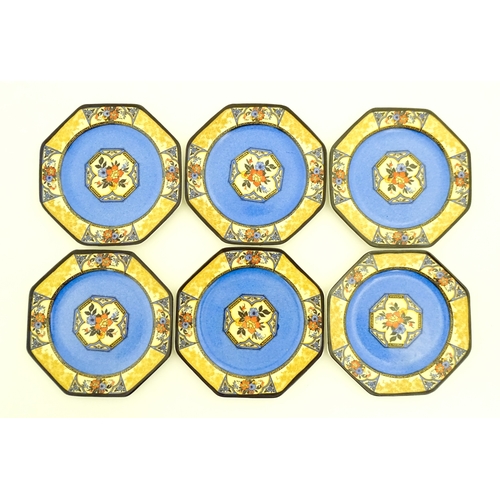 110 - A cased Wedgwood cake / sandwich service in the Melody pattern comprising serving plate, cake plates... 