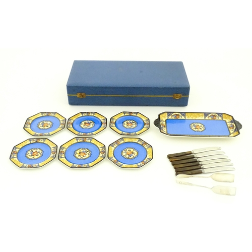 110 - A cased Wedgwood cake / sandwich service in the Melody pattern comprising serving plate, cake plates... 