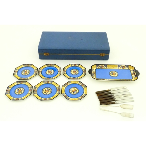 110 - A cased Wedgwood cake / sandwich service in the Melody pattern comprising serving plate, cake plates... 