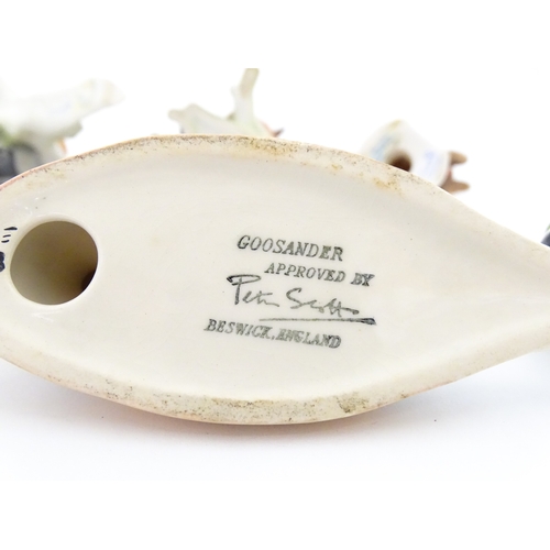 179 - Six Goebel models of birds to include Titmouse, Firecrest, Bullfinch, Robin, etc. Together with a Be... 