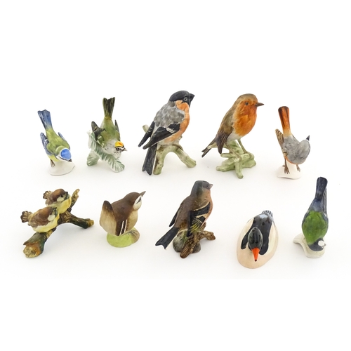 179 - Six Goebel models of birds to include Titmouse, Firecrest, Bullfinch, Robin, etc. Together with a Be... 