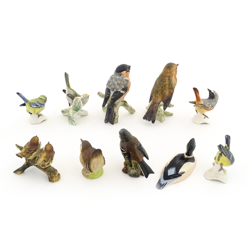 179 - Six Goebel models of birds to include Titmouse, Firecrest, Bullfinch, Robin, etc. Together with a Be... 