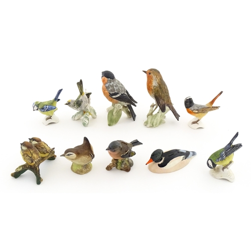 179 - Six Goebel models of birds to include Titmouse, Firecrest, Bullfinch, Robin, etc. Together with a Be... 