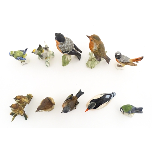179 - Six Goebel models of birds to include Titmouse, Firecrest, Bullfinch, Robin, etc. Together with a Be... 
