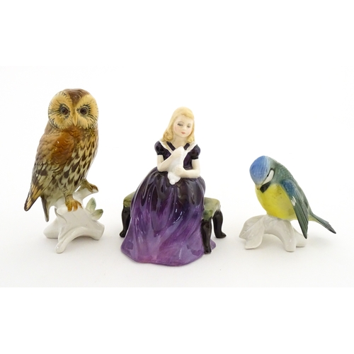 181 - Two Karl Ens models of birds comprising an owl and a blue tit. Together with a Royal Doulton model A... 