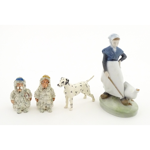 182 - Four assorted ceramic models to include a Beswick Dalmatian dog, a Royal Copenhagen Girl with Geese ... 