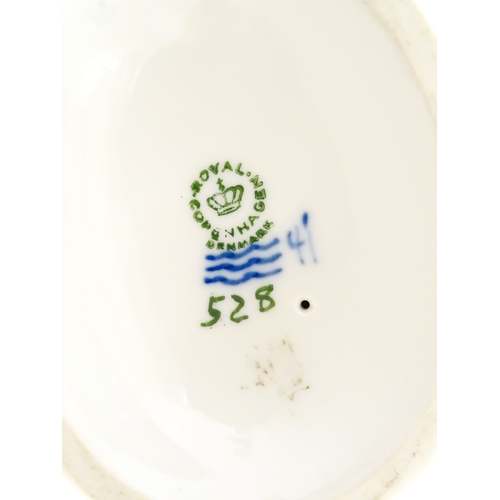 182 - Four assorted ceramic models to include a Beswick Dalmatian dog, a Royal Copenhagen Girl with Geese ... 