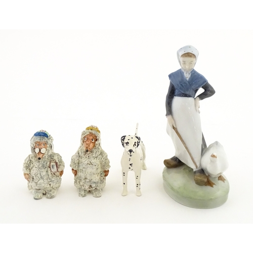 182 - Four assorted ceramic models to include a Beswick Dalmatian dog, a Royal Copenhagen Girl with Geese ... 
