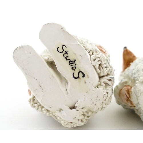 182 - Four assorted ceramic models to include a Beswick Dalmatian dog, a Royal Copenhagen Girl with Geese ... 