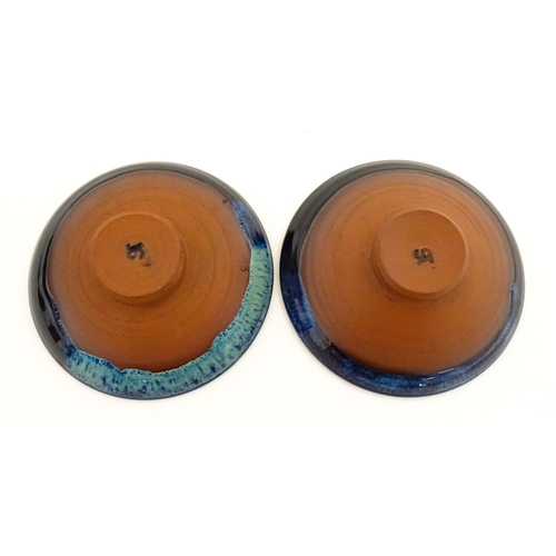 187 - Two Rupert Blamire studio pottery footed dishes. Marked under with maker's marks. Approx. 6