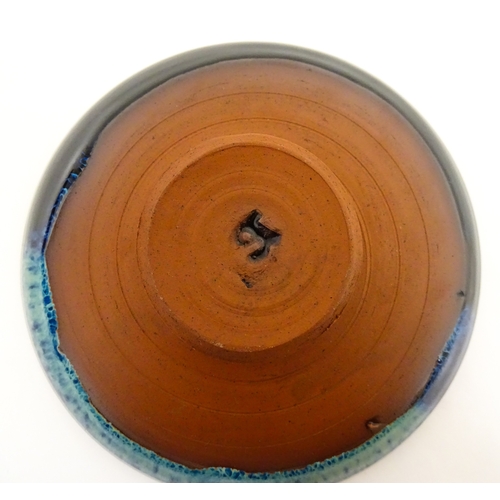 187 - Two Rupert Blamire studio pottery footed dishes. Marked under with maker's marks. Approx. 6