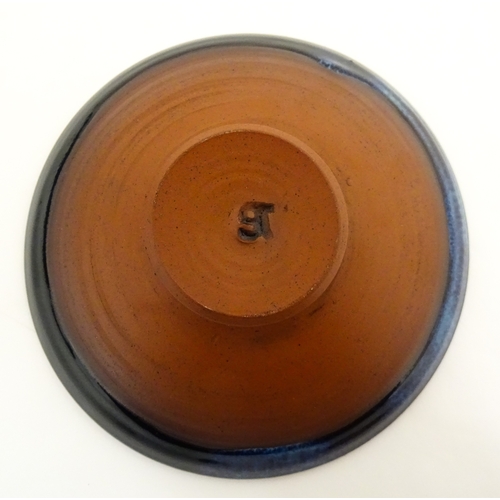 187 - Two Rupert Blamire studio pottery footed dishes. Marked under with maker's marks. Approx. 6