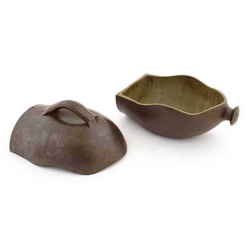 188 - A Tim Hurn (b. 1964) studio pottery wood fired salt glazed chicken brick. With impressed maker's mar... 