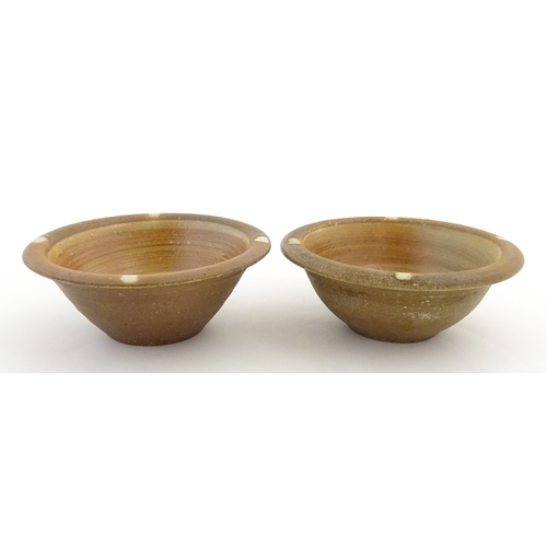 190 - A pair of Tim Hurn (b. 1964) studio pottery salt glazed bowls. With impressed maker's marks. Approx.... 
