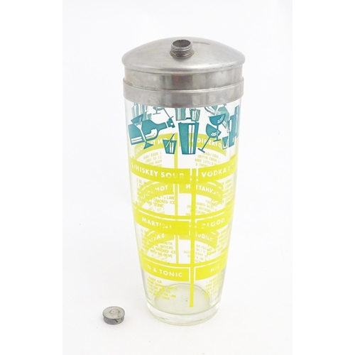 1093 - A 20thC glass cocktail shaker decorated with twelve cocktail recipes. Approx. 9 1/2
