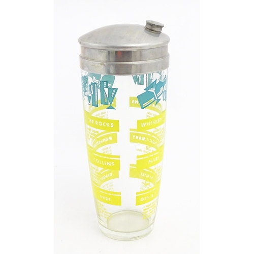 1093 - A 20thC glass cocktail shaker decorated with twelve cocktail recipes. Approx. 9 1/2