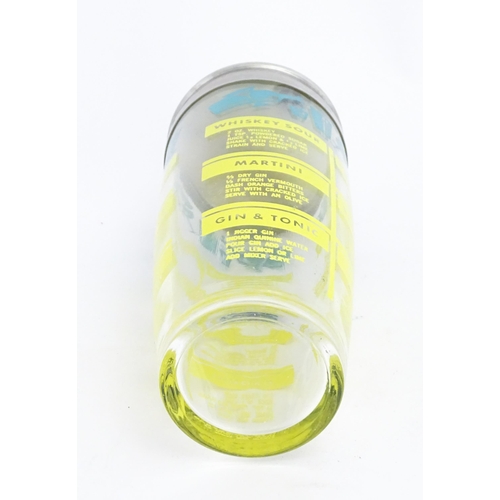 1093 - A 20thC glass cocktail shaker decorated with twelve cocktail recipes. Approx. 9 1/2