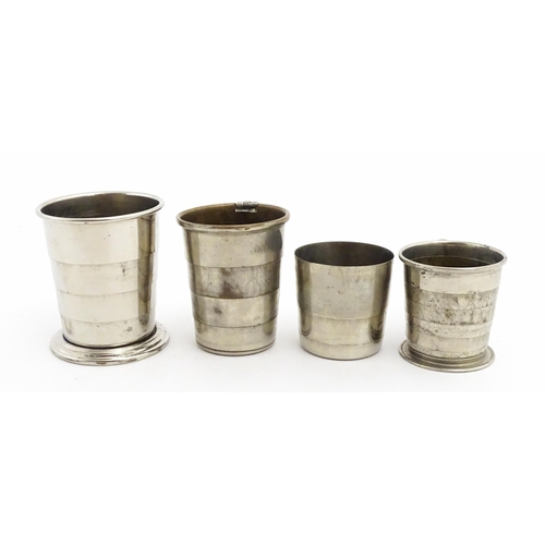 1094 - Four early 20thC silver plate collapsible stirrup cups, to include one of novelty pocket watch form.... 