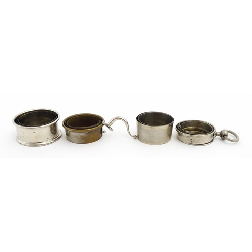 1094 - Four early 20thC silver plate collapsible stirrup cups, to include one of novelty pocket watch form.... 
